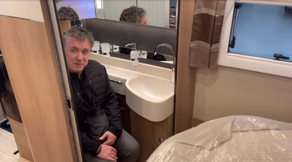 His home on wheels features a tiny en-suite bathroom off the master bedroom