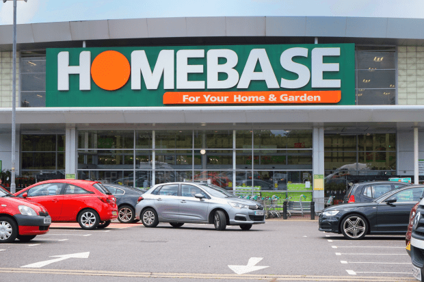 a homebase store with cars parked in front of it