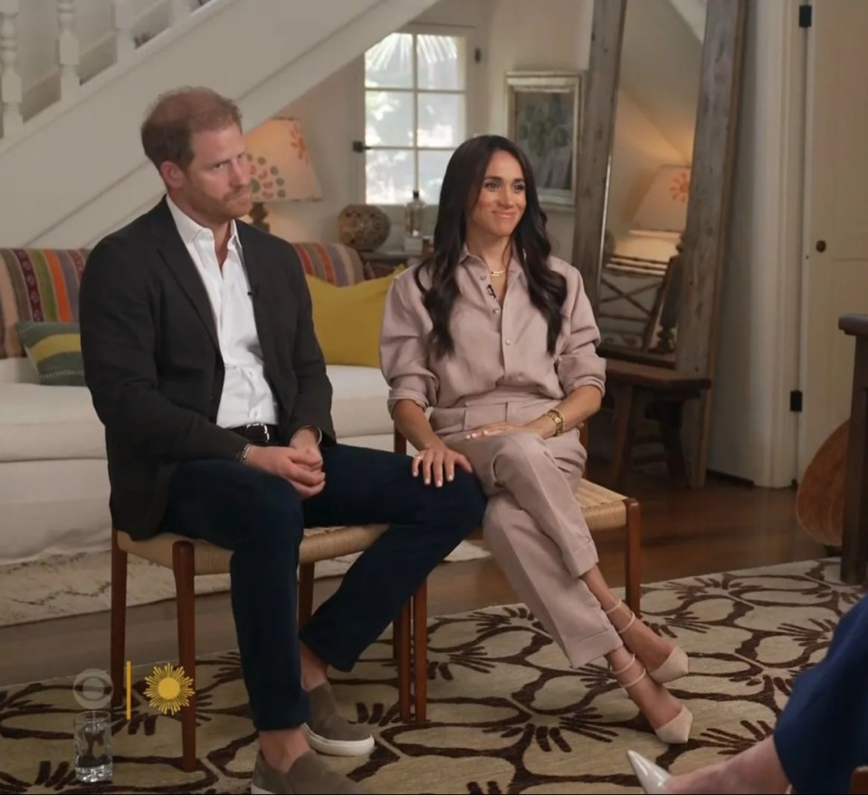 Body language expert Judi James say Harry looked ‘bleak’ at various points such as when Meghan put her hand on his knee looking for some reassurance