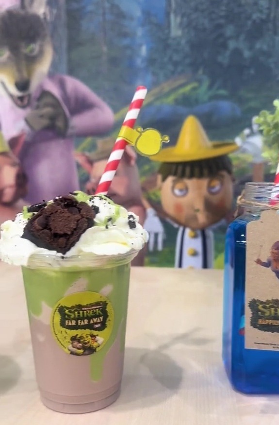 a drink that says shrek far far away on it