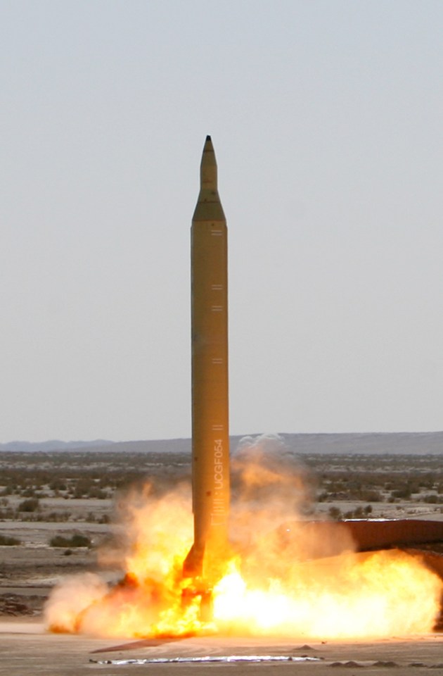 a rocket is being launched with the letters sds on the side