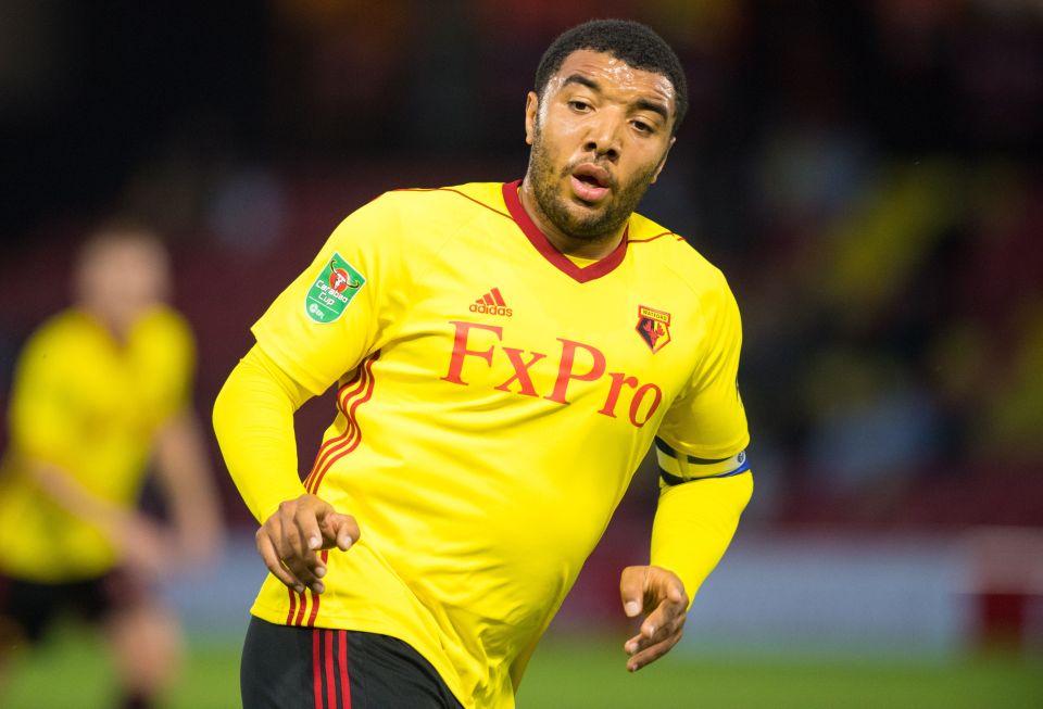 a soccer player wearing a yellow jersey with fxpro on it