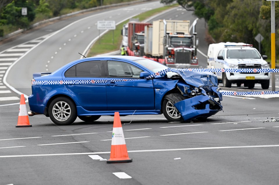 Another vehicle in the crash was cordoned off by cops