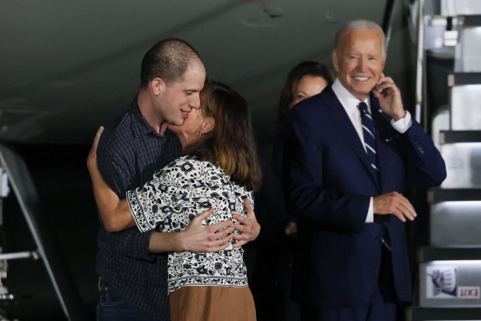 WSJ journalist Evan Gershkovich hugs his mother after arriving back in America