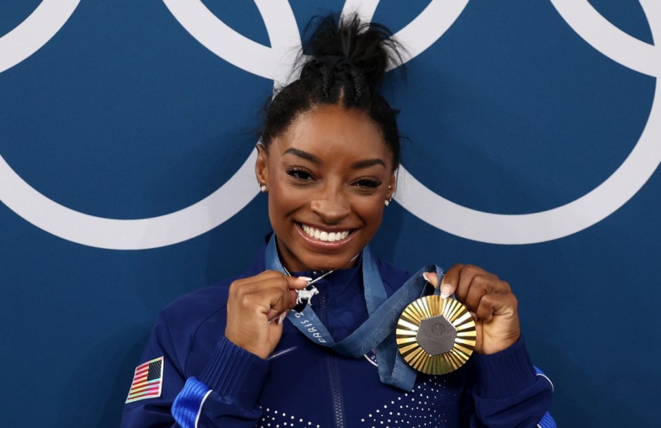 Simone Biles just about gets away with a natural shade for her nails