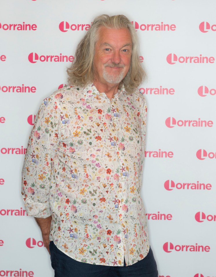 a man stands in front of a wall that says lorraine