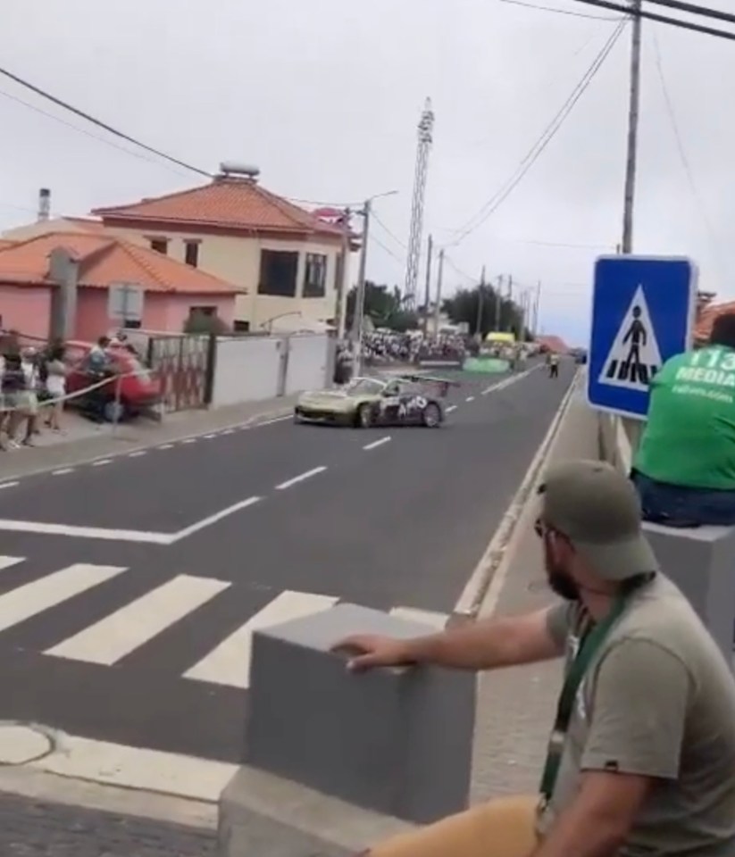 Onlookers watch on in horror as the car ploughs into spectators