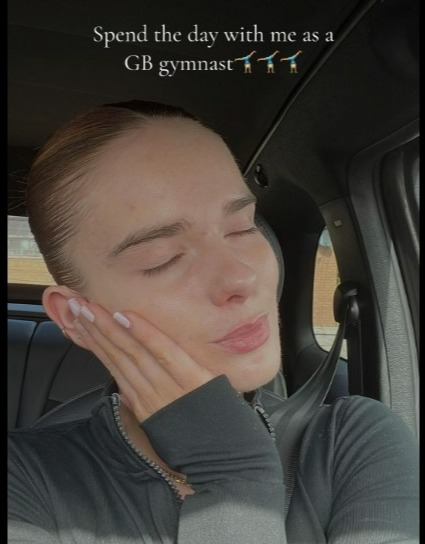 a woman sitting in a car with her eyes closed and a caption that says spend the day with me as a gb gymnast