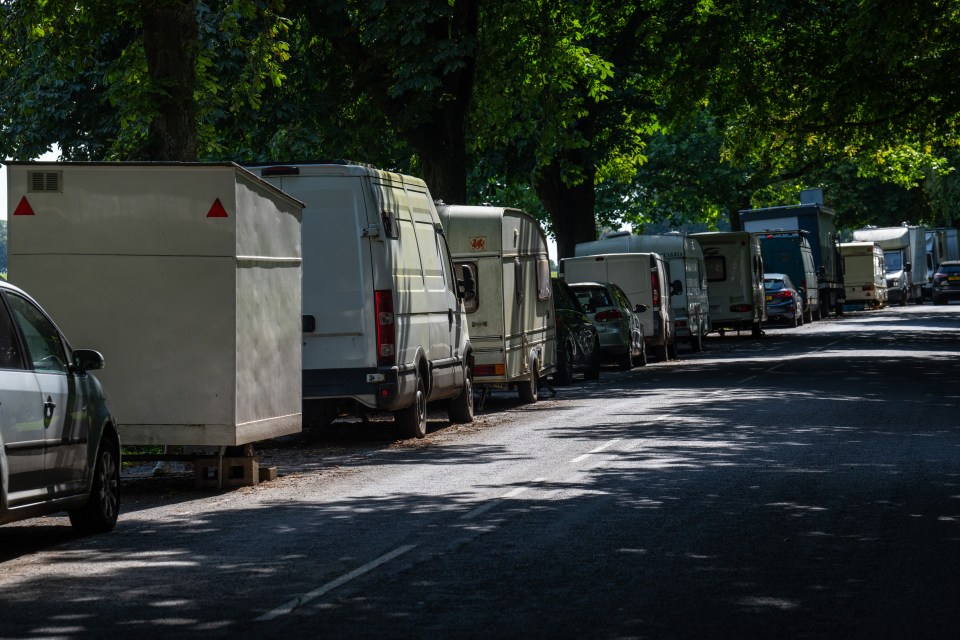 Caravans and motorhomes are parked on the roadside in Bristol