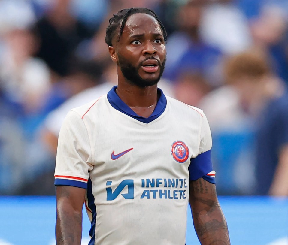 a soccer player wearing a white jersey that says infinite athlete