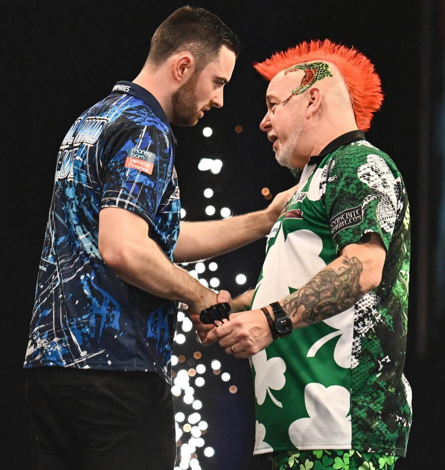 Peter Wright, right, has issued a warning to world champion Luke Humphries, left