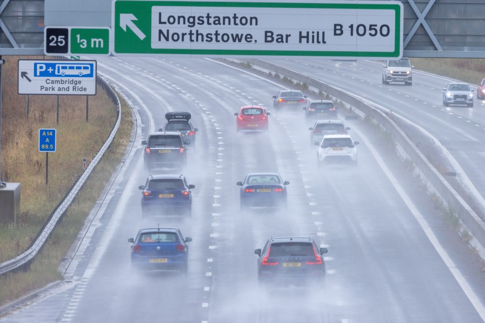 a highway with a sign that says longstanton northstowe bar hill