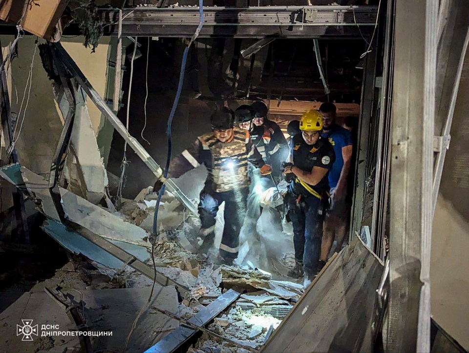 epa11566450 A handout photo made available by the Dnipropetrovsk Regional State Administration shows Ukrainian rescuers working at the site of the rocket strike in Kryvyi Rih, Ukraine, 27 August 2024, amid the ongoing Russian invasion. At least two people died and five others were injured during the overnight rocket strike at a hotel building in Kryvyi Rih according to a State Emergency Service report. Russian troops entered Ukrainian territory on 24 February 2022, starting a conflict that has provoked destruction and a humanitarian crisis. EPA/Dnipropetrovsk Regional State Administration / HANDOUT BEST QUALITY AVAILABLE HANDOUT EDITORIAL USE ONLY/NO SALES