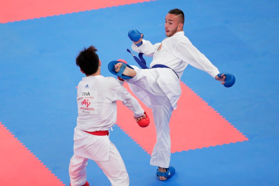 TOKYO, JAPAN - SEPTEMBER 06: Steven Dacosta (blue) of France and Supa Ngamphuengphit (red) of Thailand compete in the Mens Kumite -67kg Pool 4 Round 2 match on day one of the Karate 1 Premier League at Nippon Budokan on September 6, 2019 in Tokyo, Japan. (Photo by Kiyoshi Ota/Getty Images)