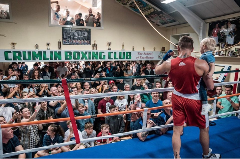 a boxing ring with a sign that says crumlin boxing club