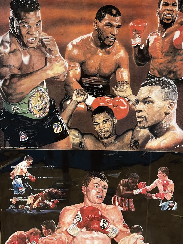 a painting of mike tyson fighting another boxer