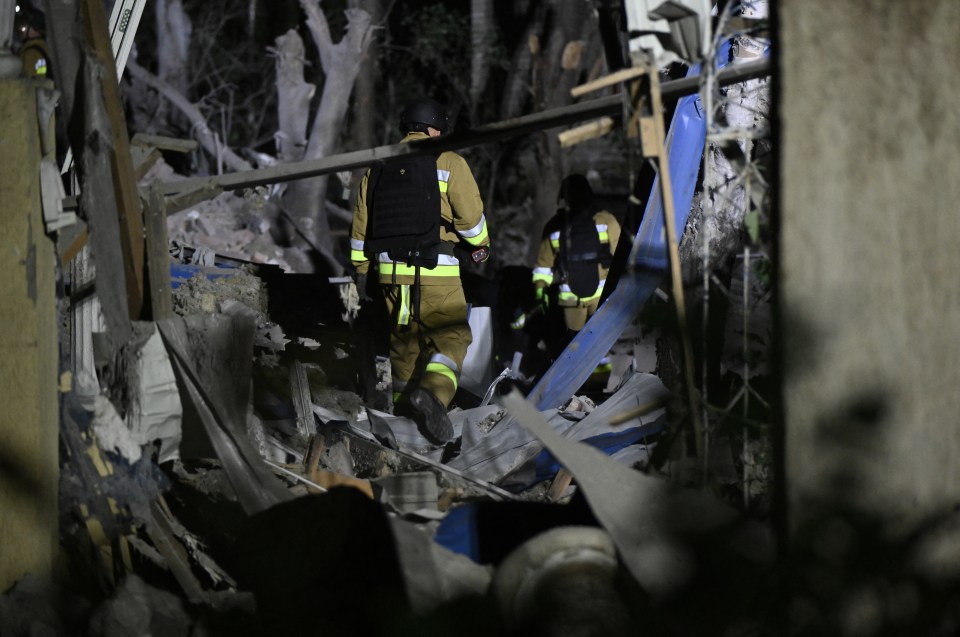 Ukrainian emergency services conduct a search and rescue operation among the rubble of a destroyed hotel following a Russian strike in the town of Kramatorsk early in the morning on August 25, 2024, amid the Russian invasion of Ukraine. A nighttime Russian strike on a hotel in the eastern Ukrainian city of Kramatorsk wounded two journalists, while a third was missing in the rubble, authorities said Sunday. Vadym Filashkin, head of the Donetsk regional government, said the journalists were British, US and Ukrainian nationals and that a search operation was underway for the missing journalist. (Photo by Genya SAVILOV / POOL / AFP) / SOLELY FOR REUTERS (Photo by GENYA SAVILOV/POOL/AFP via Getty Images)