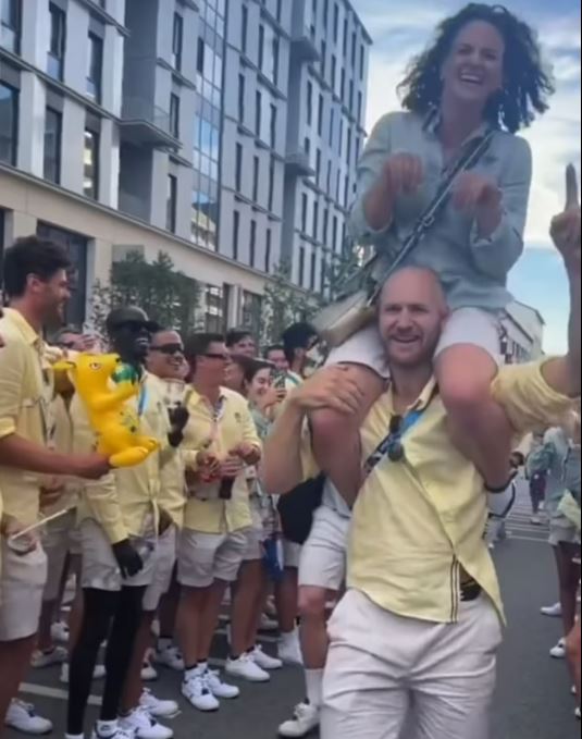 She was held aloft by her team-mates after the performance