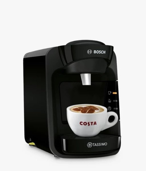 a bosch coffee maker with a cup of costa coffee