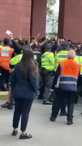 A gang of fans brawled with police outside Stamford Bridge