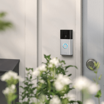 a ring doorbell is mounted on the side of a door