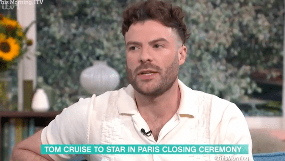 a man with a beard is on a television show called tom cruise to star in paris closing ceremony