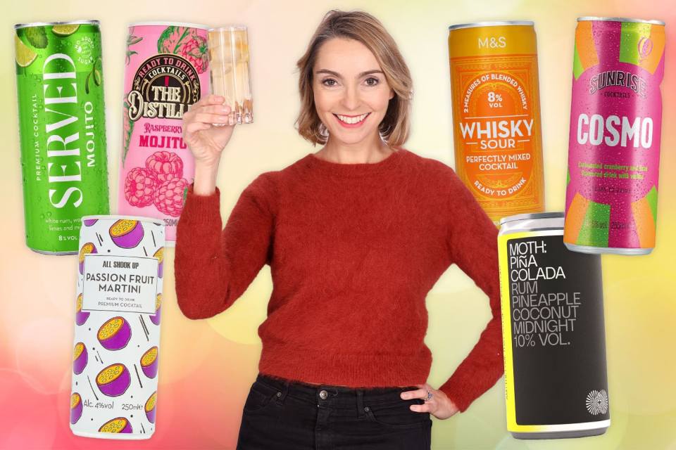 a woman holds a glass in front of a can of whisky sour