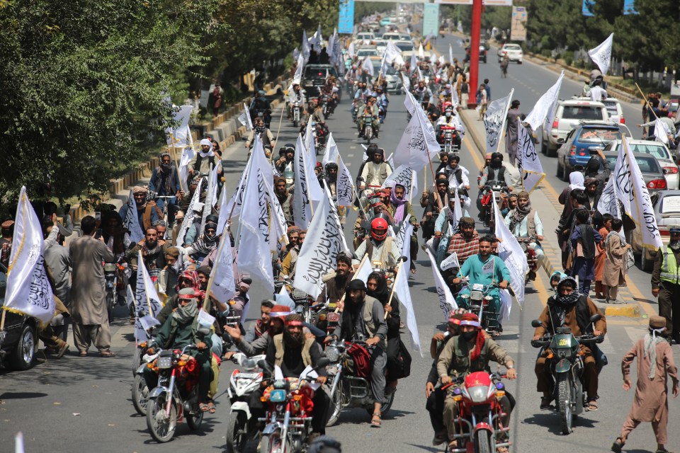 Taliban fighters celebrating the anniversary of their takeover of Afghanistan