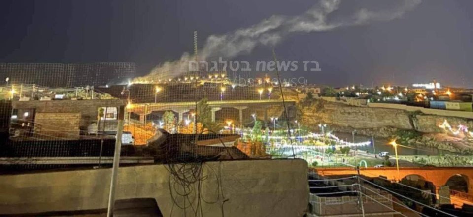 Another image report to show smoke rising from the base near Baghdad