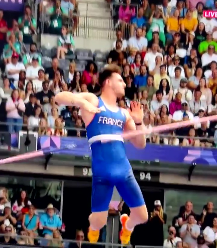 a man in a blue tank top with the word france on it