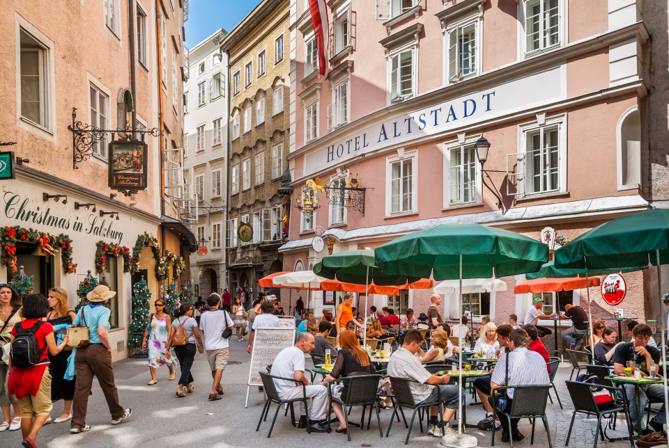 Grab a bite to eat at the open-air cafe in Salzburg's old town