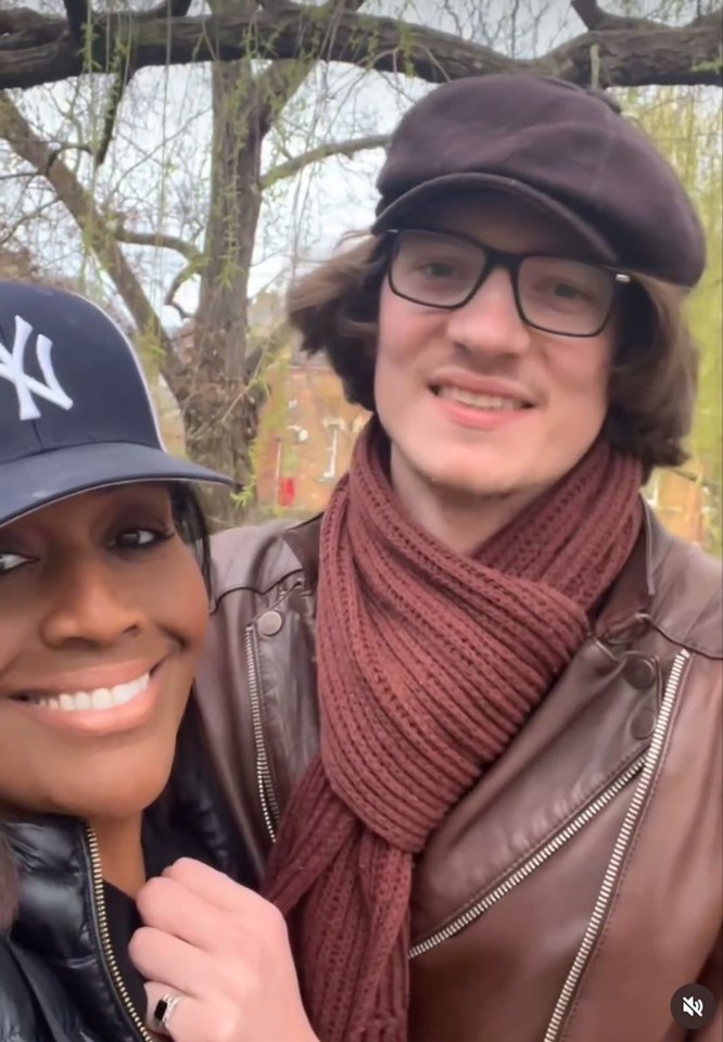 a man wearing glasses and a hat with ny on it