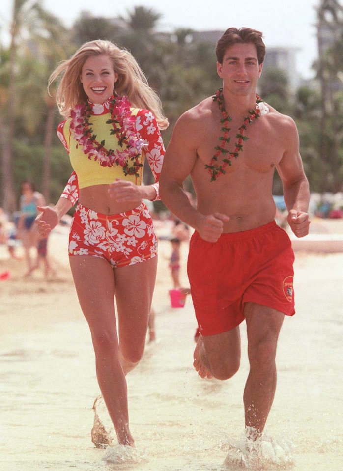 Brooke Burns and Michael take a jog in the beach for Baywatch: Hawaii