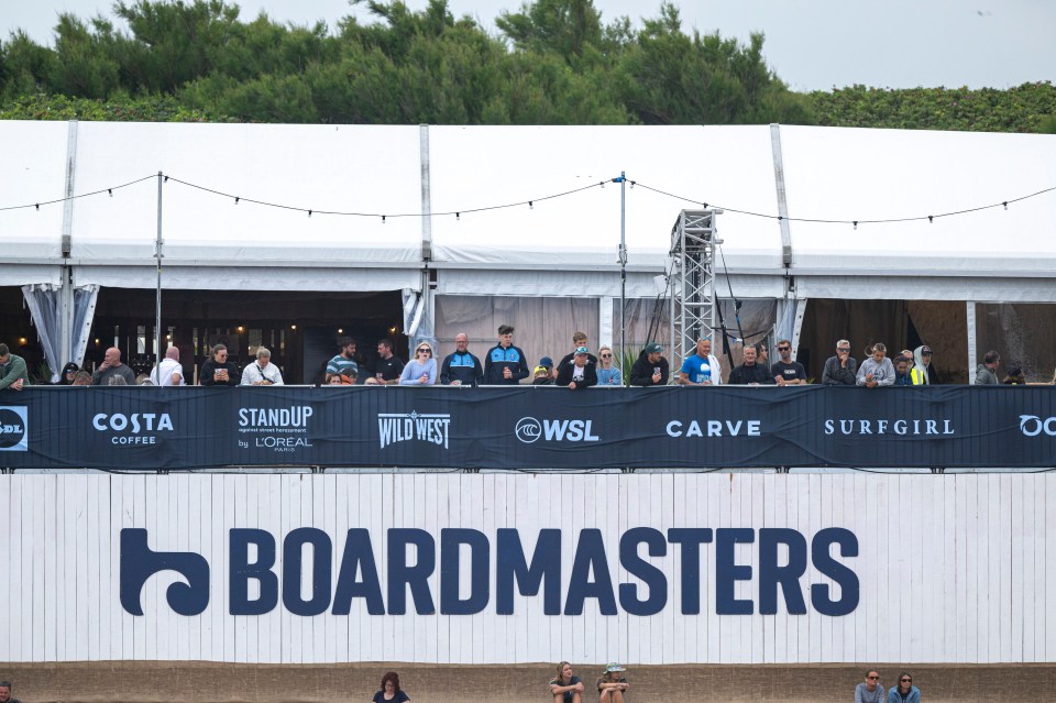 a group of people are watching a boardmasters event