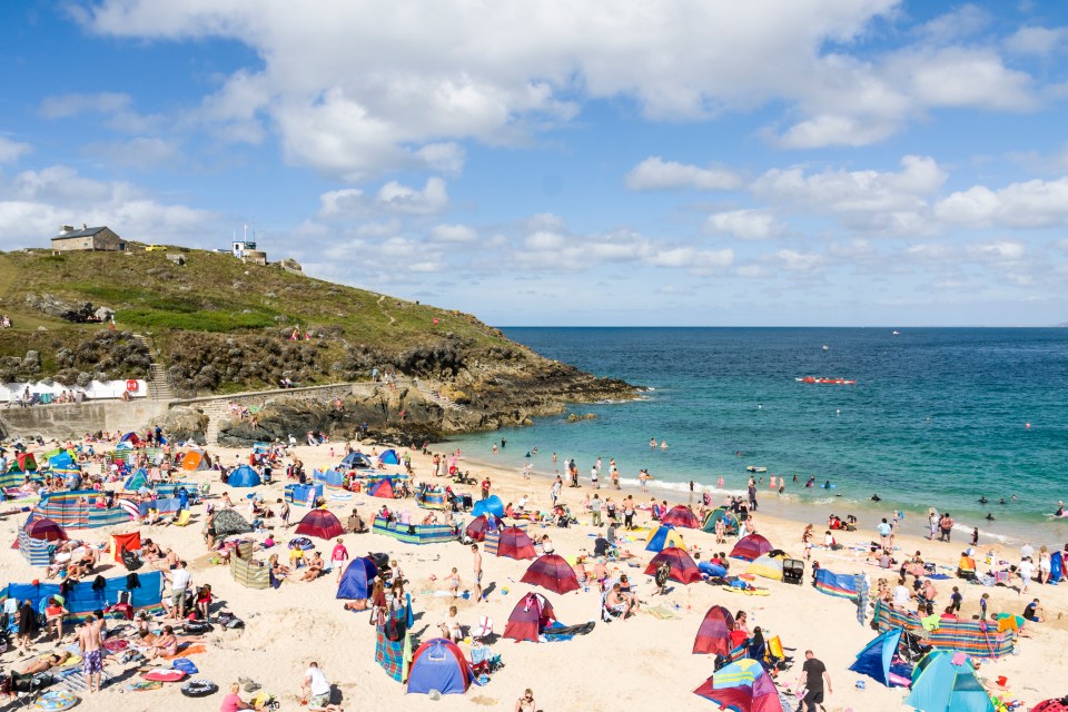 St Ives, which is known for its surfing beaches, sees around 540,000 day-trippers and 220,000 staying visitors every year (file image)