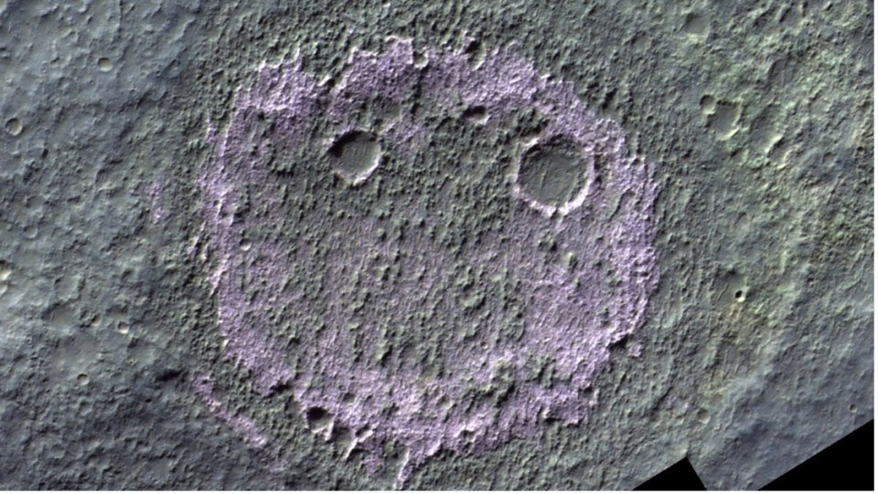 a gray surface with a purple circle in the middle