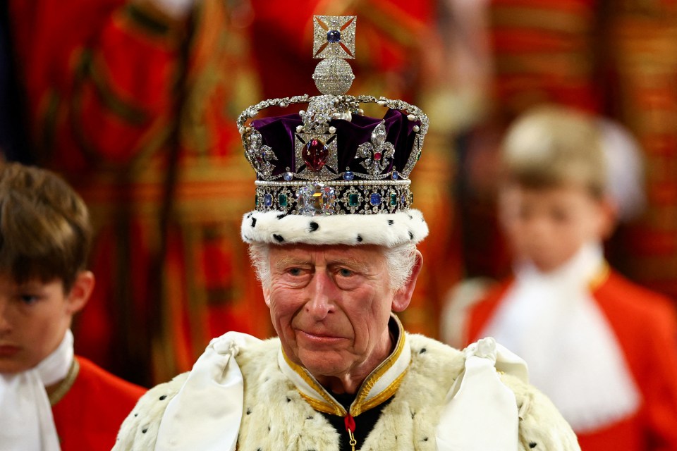 King Charles wearing his crown at the state opening of Parliament