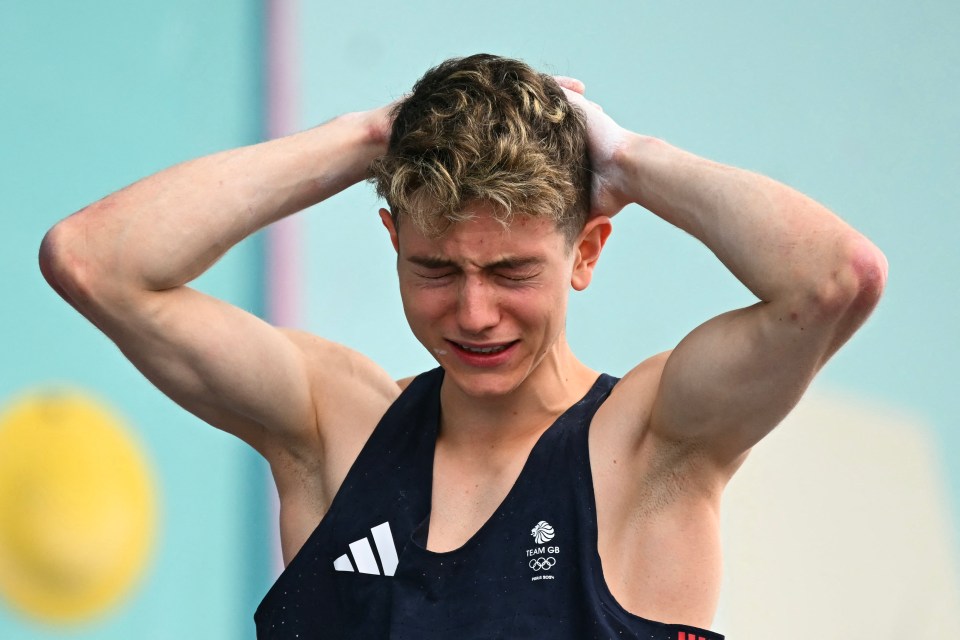 An emotional Roberts reacts after winning gold at Paris 2024