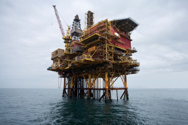 a large oil rig in the middle of the ocean