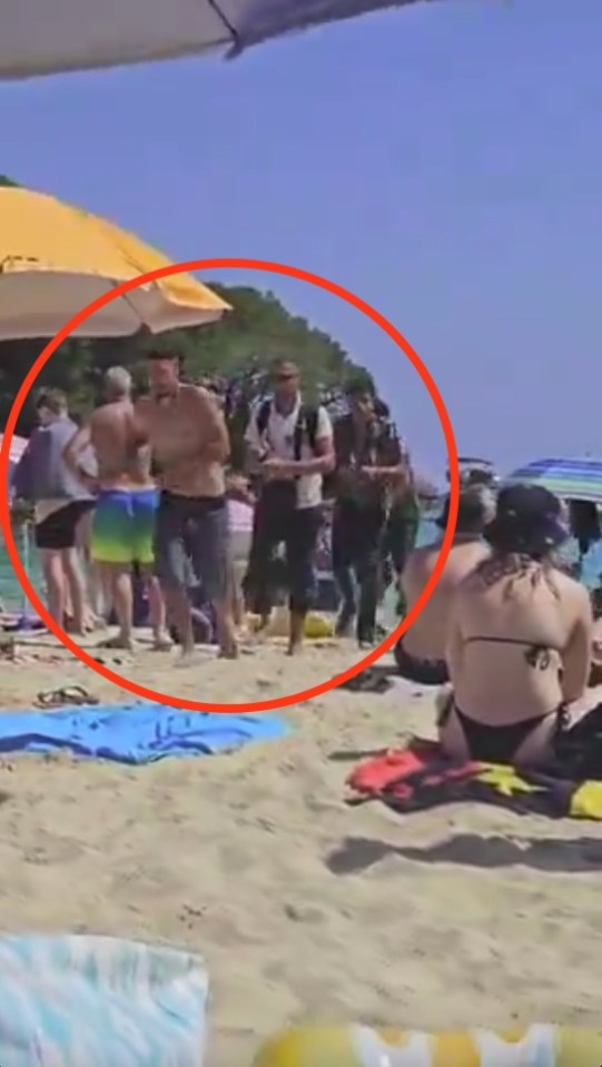 A video shows migrants arriving on a Brit holiday hotspot beach