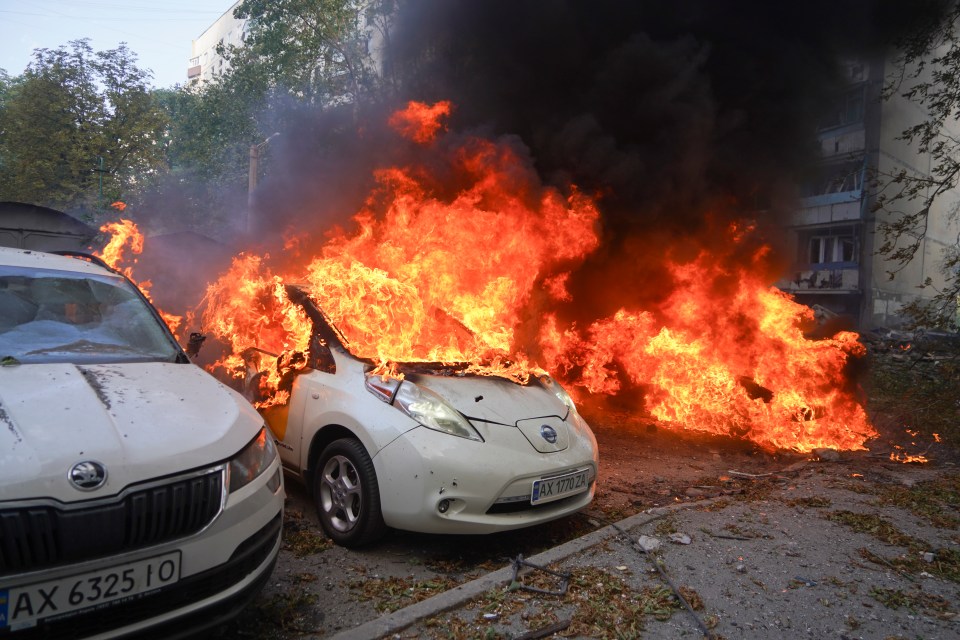 A nearby car caught on fire following the strike