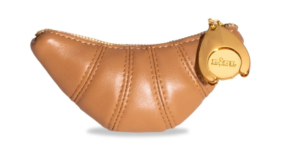 a brown purse that looks like a croissant