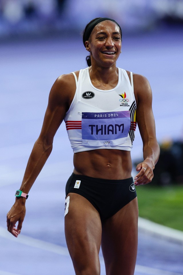 a female runner with the name thiam on her shirt