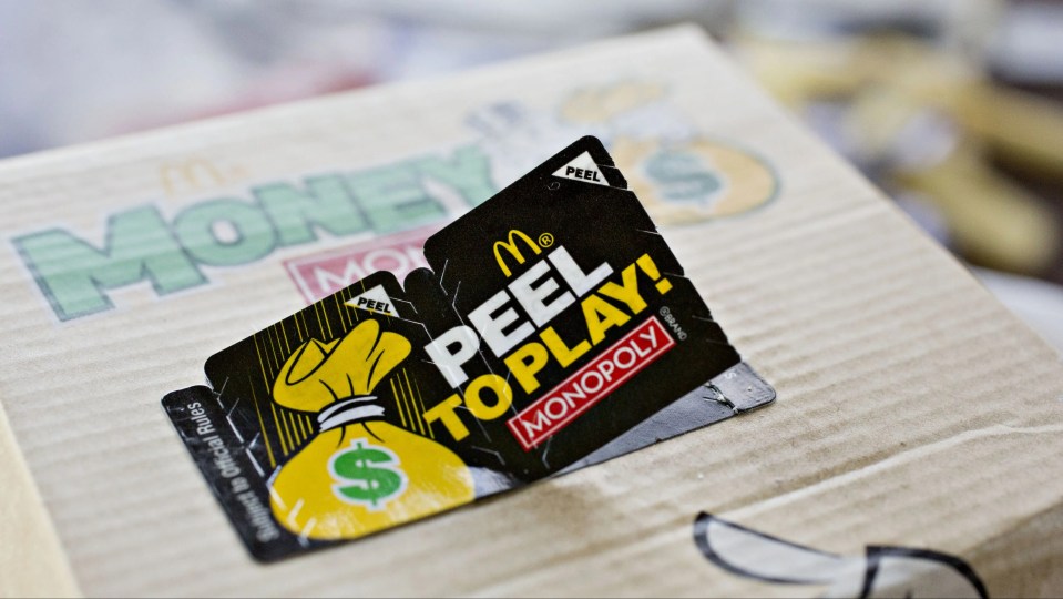 a mcdonald 's monopoly peel to play card