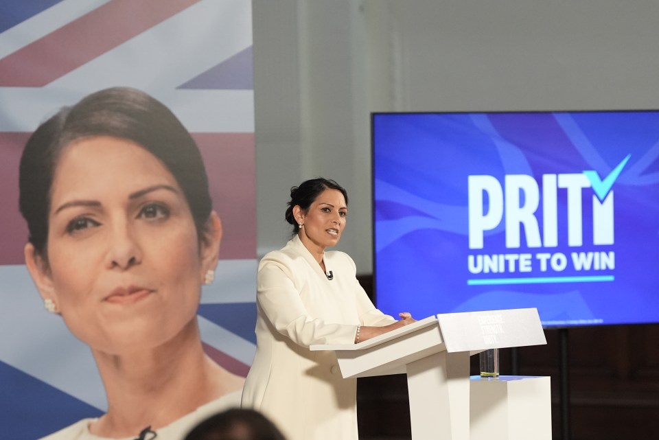 Dame Priti pointed to an image of herself at Lindley Hall in London