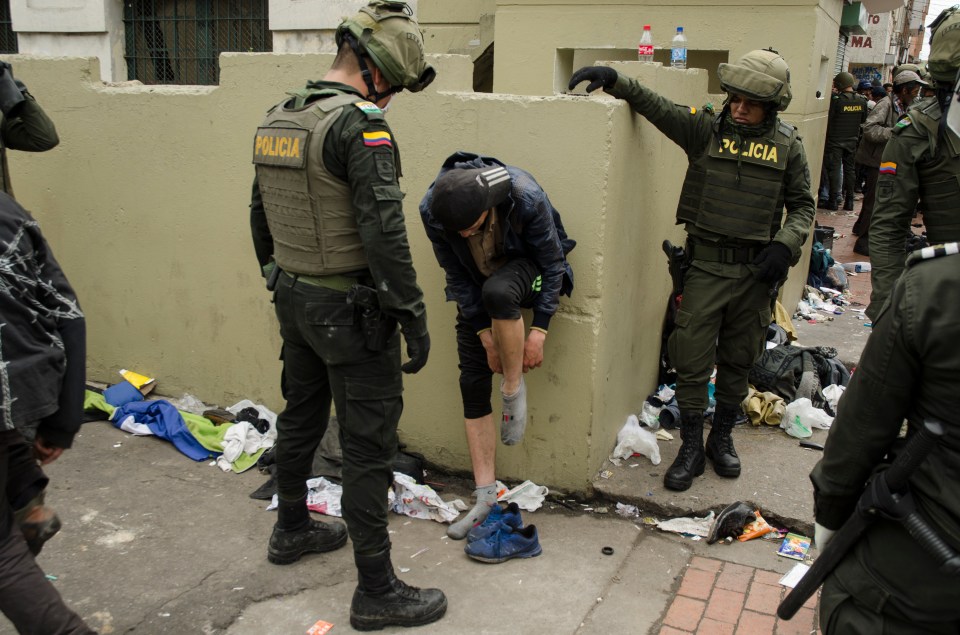 a group of police officers with the word policia on their uniforms