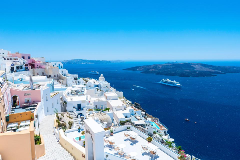 The Greek island (pictured) is known for its white and blue architecture