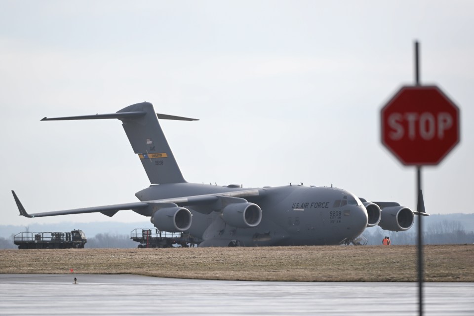 a large u.s. air force plane is parked on the runway