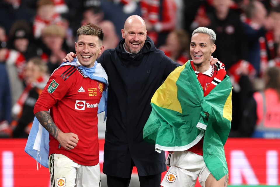 three soccer players are posing for a picture with one wearing an adidas jersey