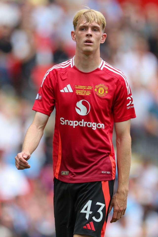 a man wearing a red jersey with snapdragon on it